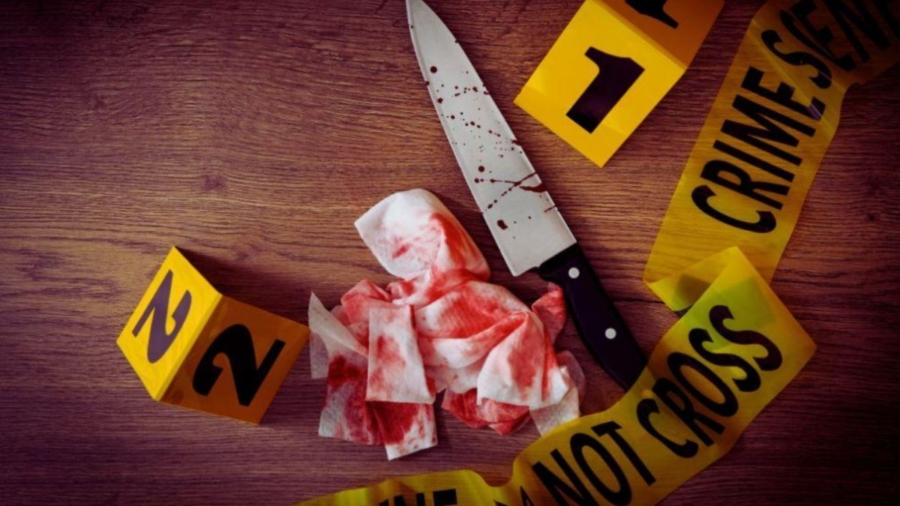 A knife and a blood-stained rag lie on a table, marked by caution tape, indicating a serious crime investigation.